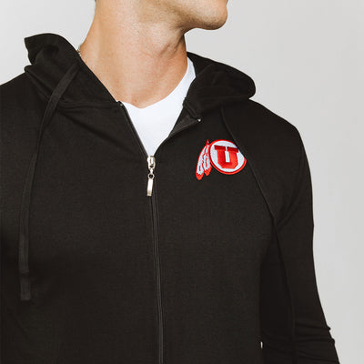 Close up on mens black zip jacket with Utah logo