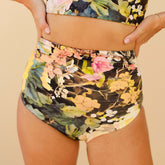 Close up front view of high waist ruched swim bottoms