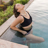 Close up of women's black bikini to in italian terry fabric