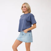 Front view of Perfect Oversized Cotton Tee showcasing its blue oversized fit on a model against a white studio background