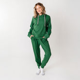 Model wearing womens matching pj set green