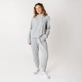 Model wearing womens matching sweat set in heather grey
