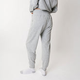Back view of women's grey sweatpant joggers