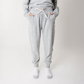 Close up of women's grey sweatpants jogger style