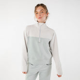 Front view of two tone quarter zip sweatshirt