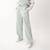 Close up front view of wide leg sweatpants in neo fabric with soft mint color