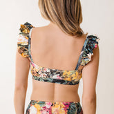 Close up back view of low back bikini top with ruffle sleeves