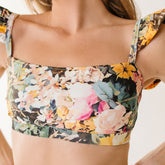 Close up of floral details on bikini top