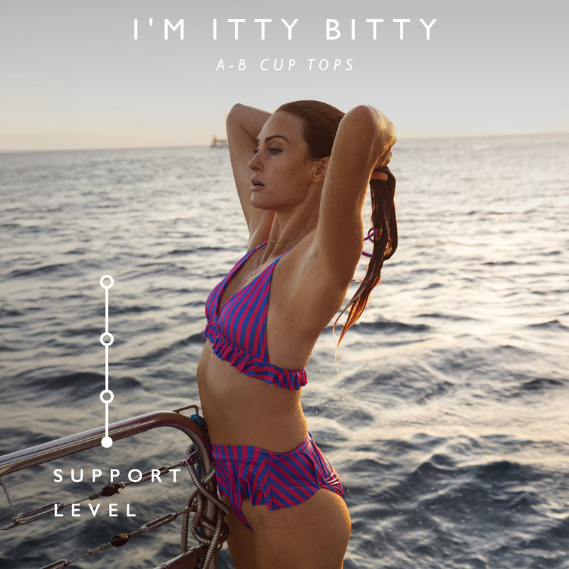Woman in a purple bikini on a boat with text about 'I'm Itty Bitty' A-B cup tops.