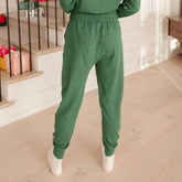Back view of womens joggers sweatpants in green