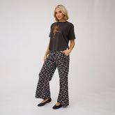 Front view of vintage black Perfect Jester Tee with a jester graphic in a loose fit against a gray studio background