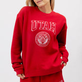 Red sweatshirt with 'Utah' and a logo on a white background
