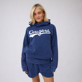 Front view of navy BYU Cougars hoodie with a relaxed fit on a model against a light gray background