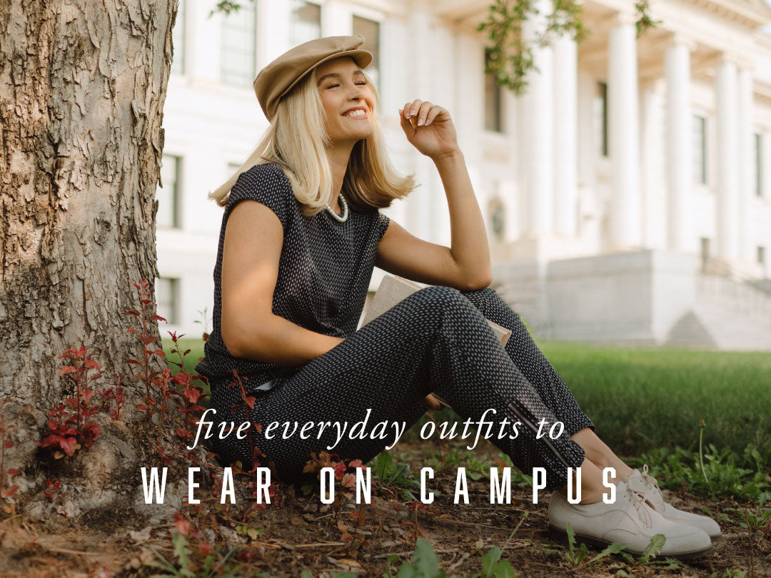Woman in a black patterned outfit sits under a tree on a campus lawn; text reads Five everyday outfits to wear on campus