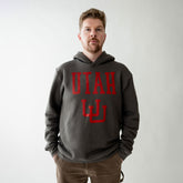 Man wearing a gray hoodie with 'UTAH' printed in red on a plain background