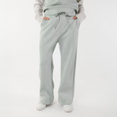 Close up front view of wide leg sweatpants in soft mint color