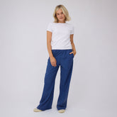 Front view of Blue/Blue Polka Dot Slip On Trouser showing wide-leg fit on model in light gray studio