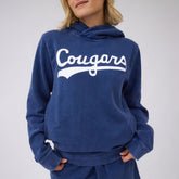 Front view of navy BYU Campus Hoodie showcasing white Cougars graphic and hood on a model against a gray background