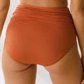 Back view Rust Ruched swim bottoms