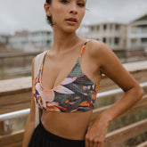 woman wearing floral bralette swim top